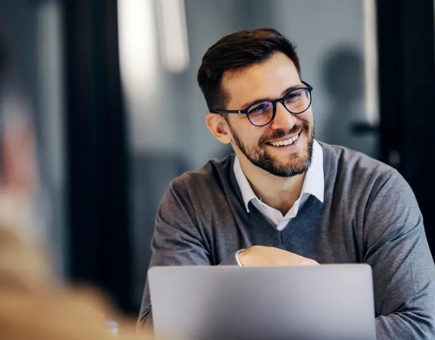 A litigation lawyer working at a laptop